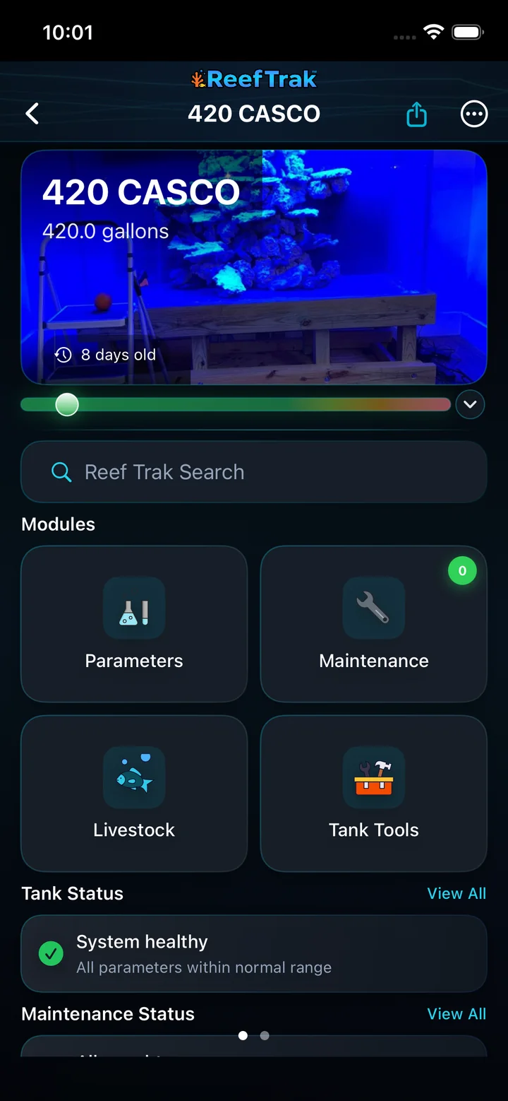 Reef Trak tank overview on iPhone with the TrakShare button in the top-right corner